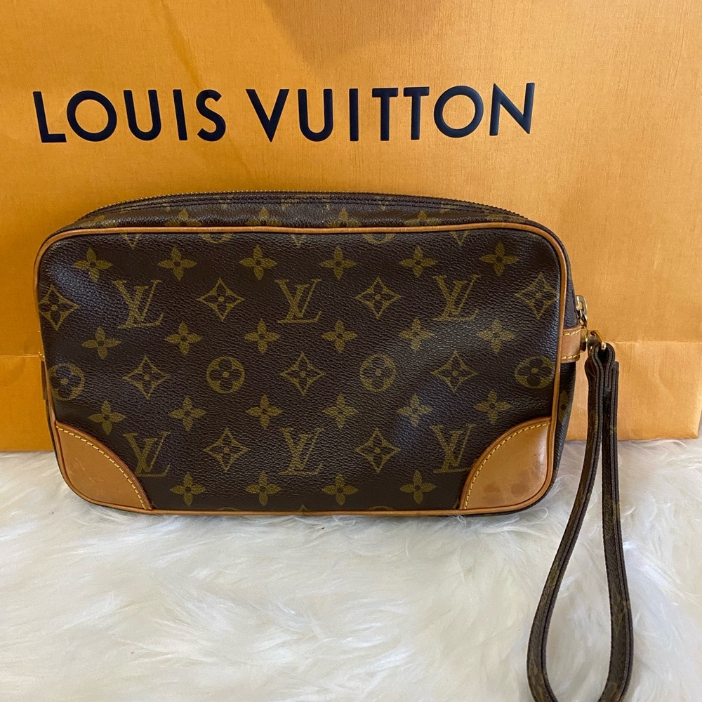 Authentic Louis Vuitton Marly Dragon clutch monogram canvas